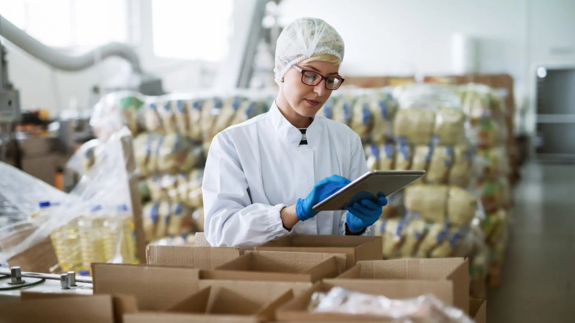 A food authority woman thouroughly inspecting food because hygienic food should be your top priority